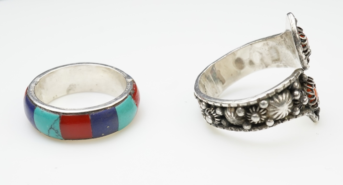 A collection of silver jewellery including a Zuni bangle